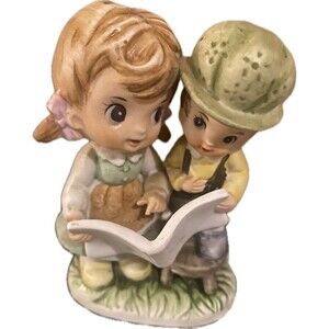 Vintage Artmark figurine girl reading to a little boy